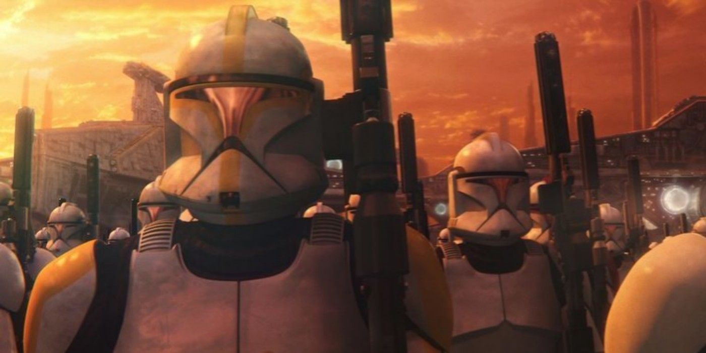 Clone Troopers standing at attention against an orange sky in Star Wars: Attack of the Clones.
