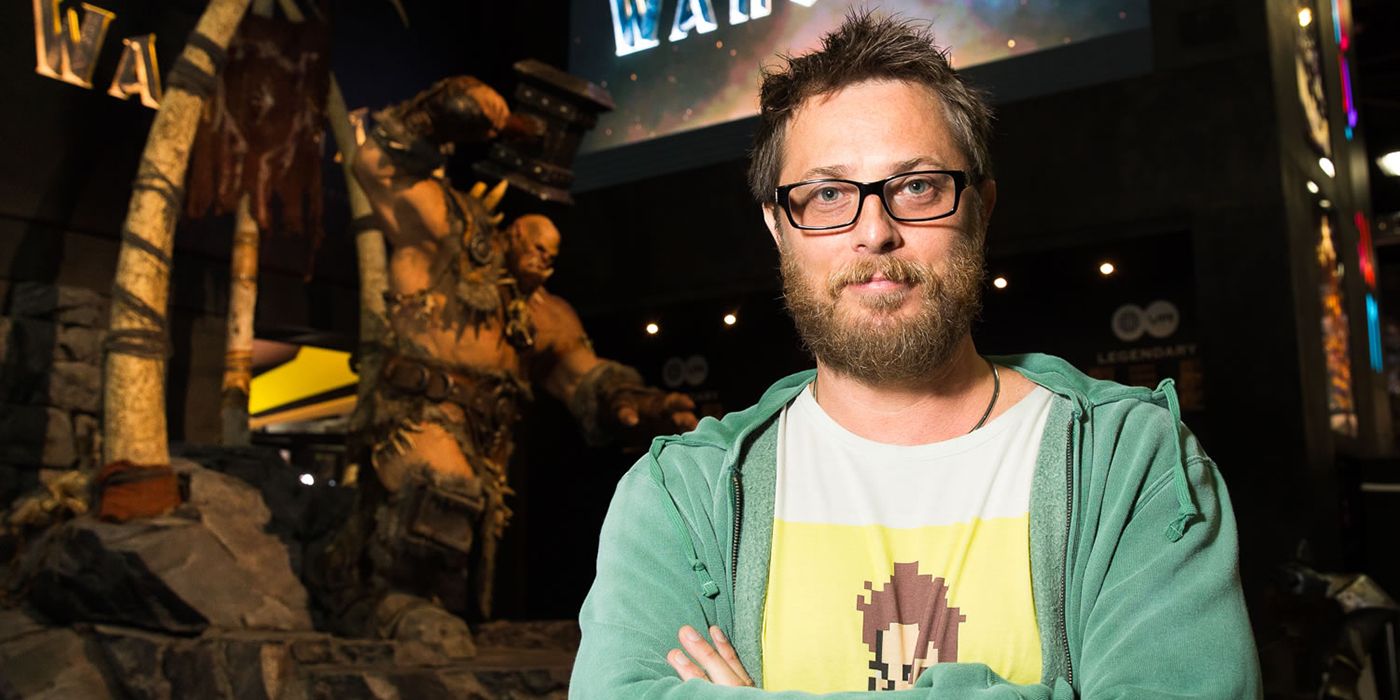 Director Duncan Jones with a Warcraft statue.