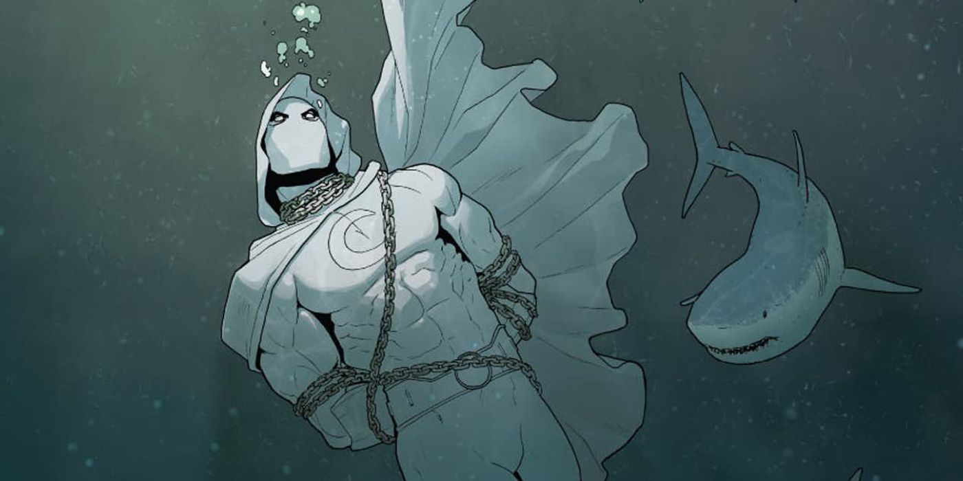 Moon Knight wrapped in chains about to be eaten by a shark