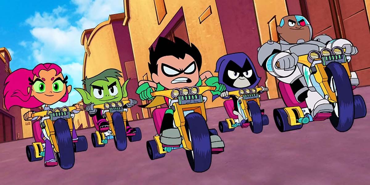 Teen Titans Go! to the Movies, the Teen Titans riding through Warner Bros. studios on tricycles. 