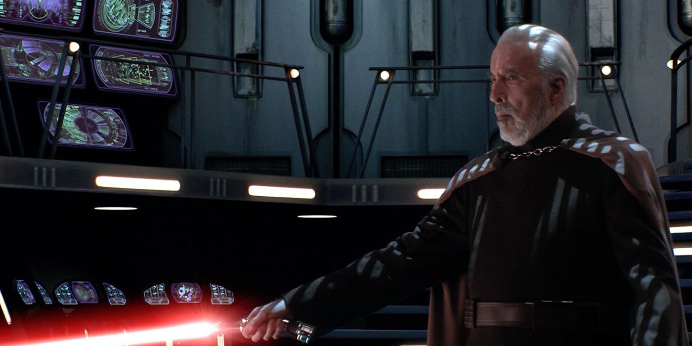 Dooku holds his unique red lightsaber