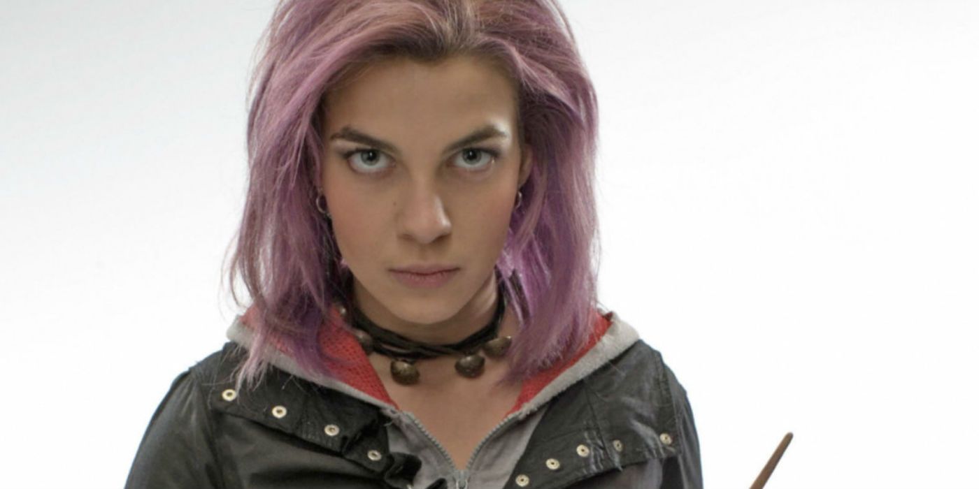 Nymphadora-Tonks standing against white background, holding wand