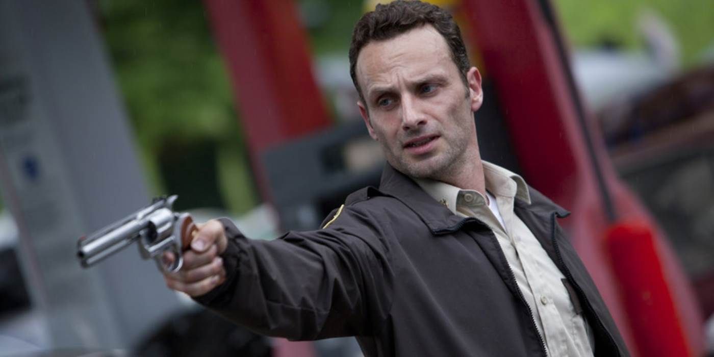 Rick Grimes aims his gun in The Walking Dead Season 1 premiere.