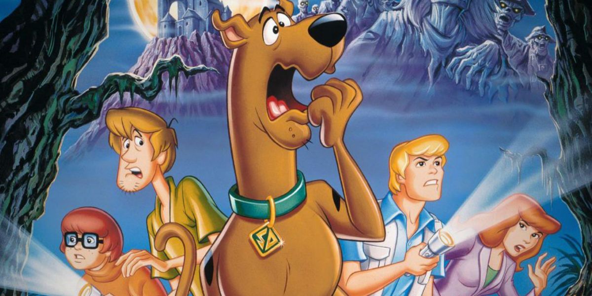 Scooby-Doo and the gang investigate in the woods in Scooby-Doo on Zombie Island