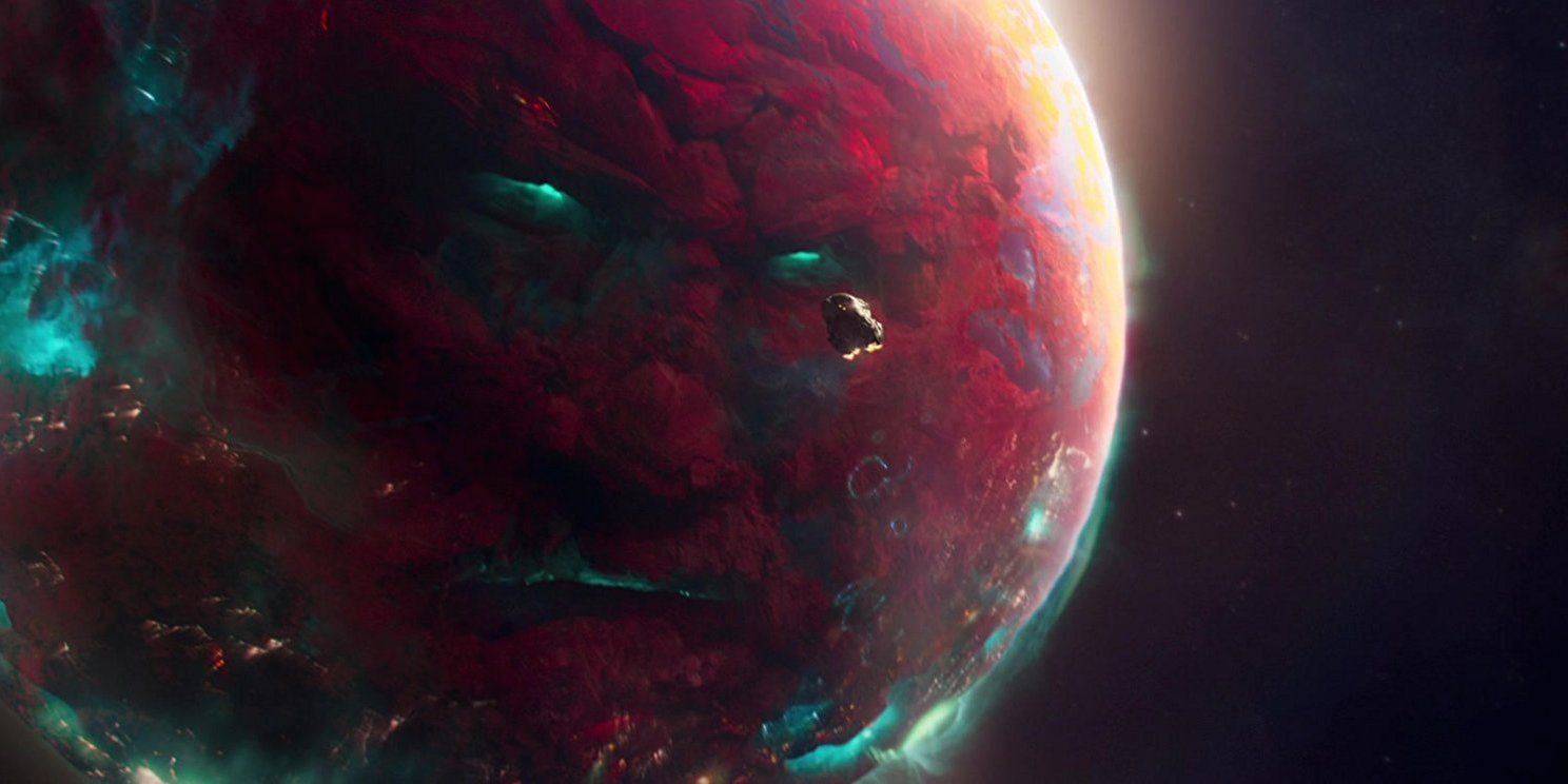 Ego The Living Planet from the MCU watches as a ship flees from him.