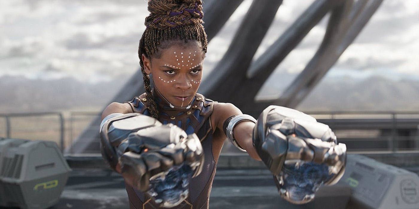 Shuri aiming her gauntlets in Black Panther