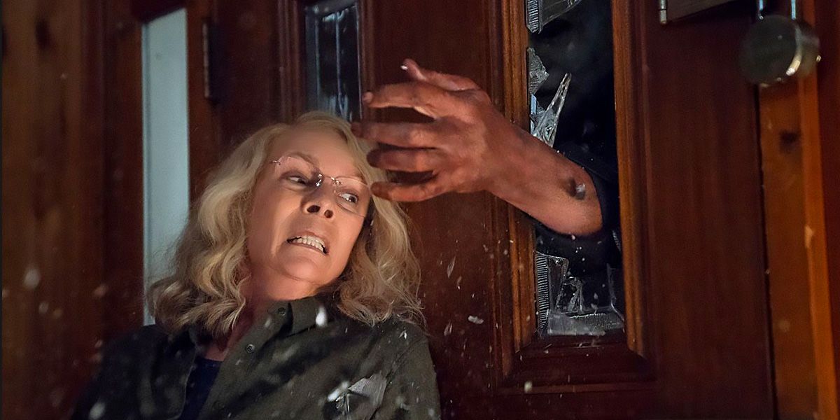 Jamie Lee Curtis' Laurie Strode braces for an attack from Michael Myers in 2018's Halloween
