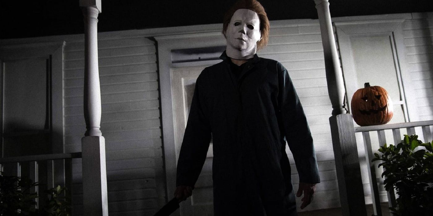 Halloween's Michael Myers standing on the porch of his house