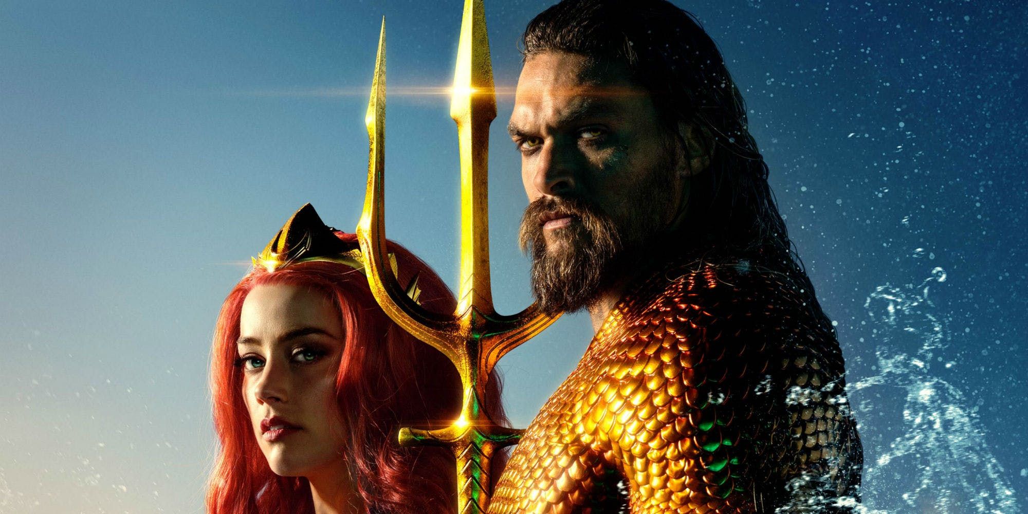 Aquaman movie poster featuring Arthur Curry and Mera in classic costumes