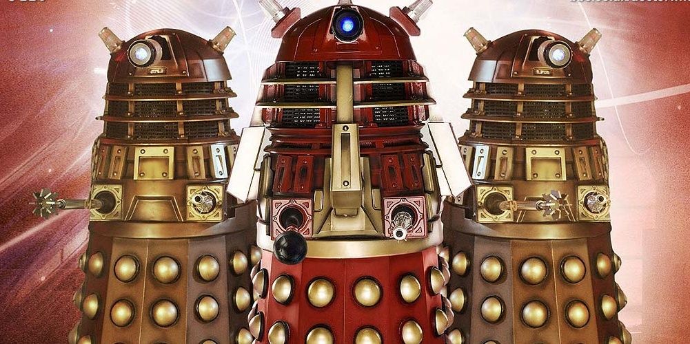 Three Daleks against a red background