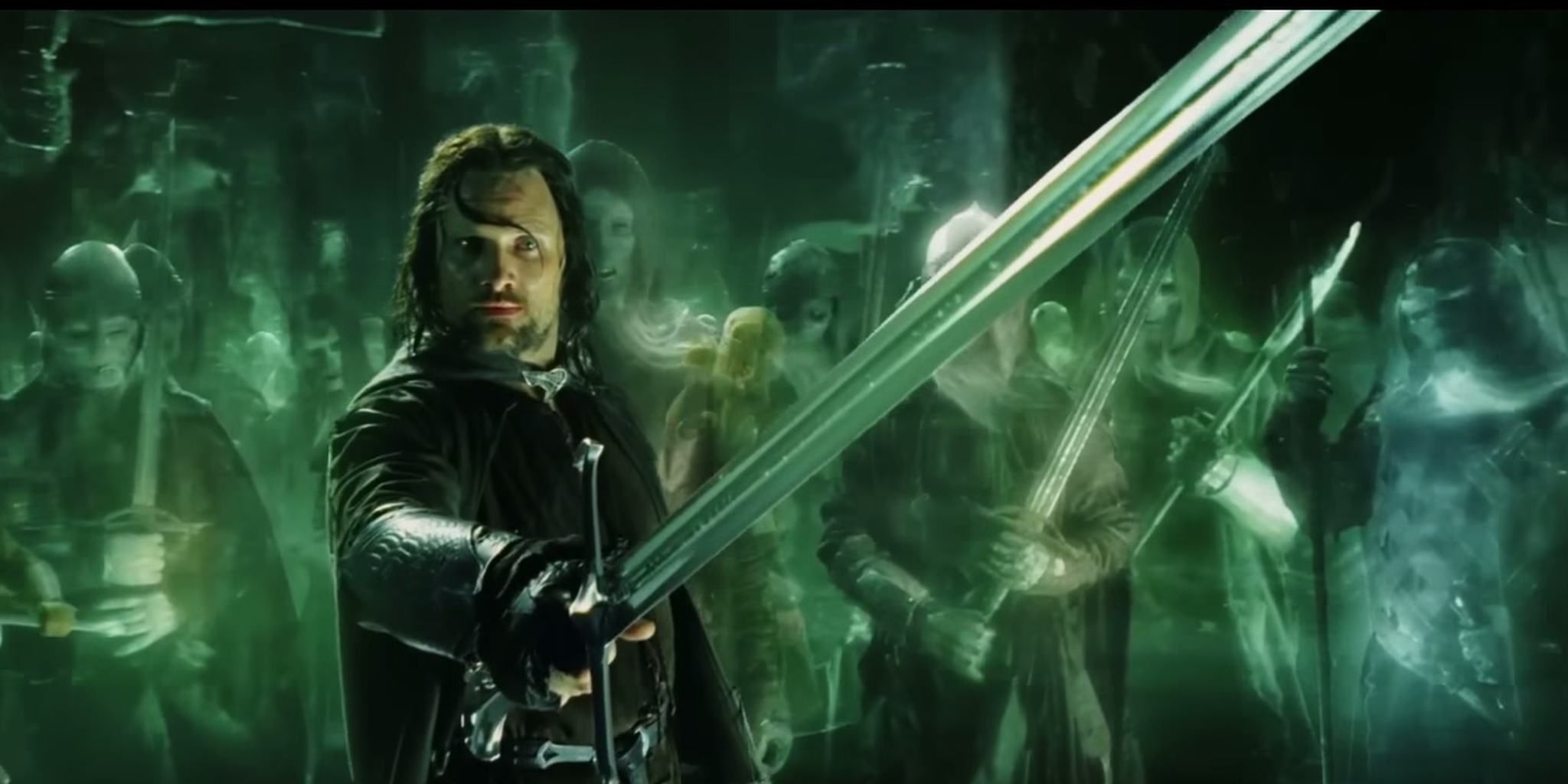 Aragorn points the Andruil sword