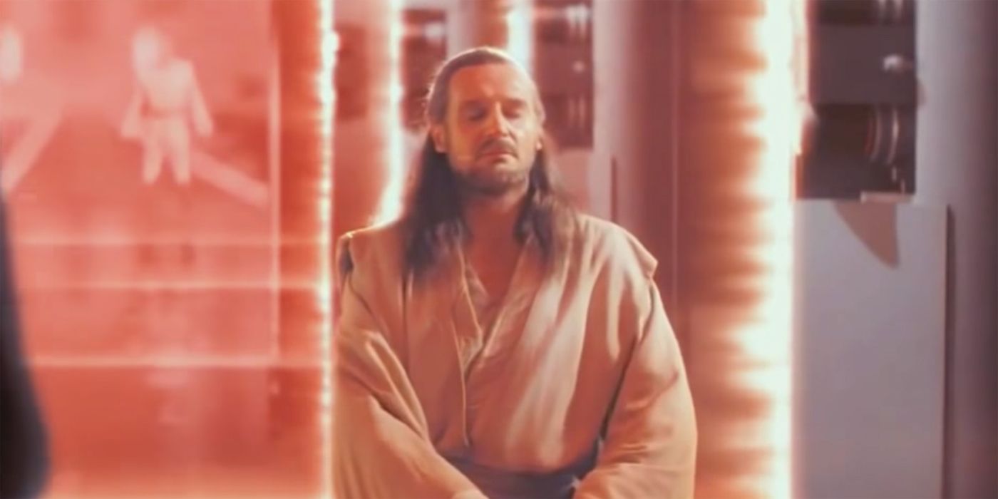 Qui-Gon Jinn meditating as Ob-Wan waits in the background