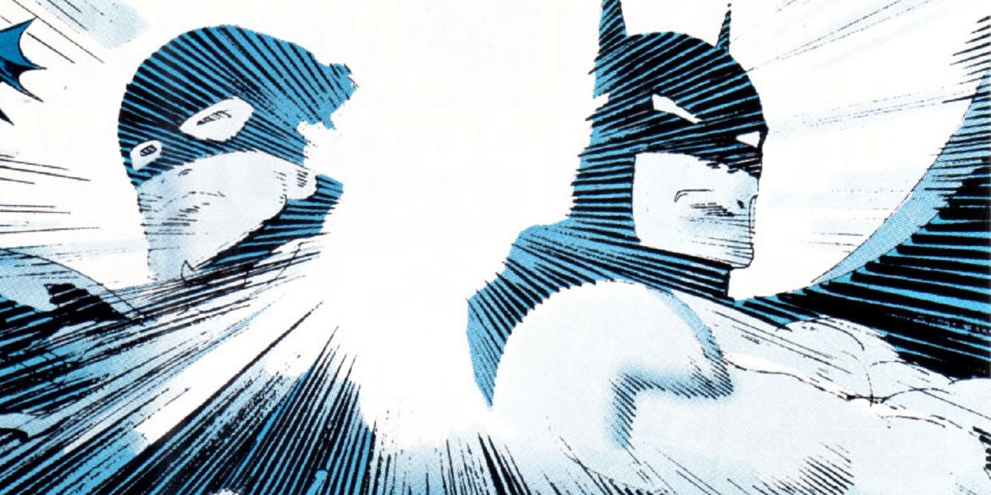 batman and zorro silhouetted by blue light