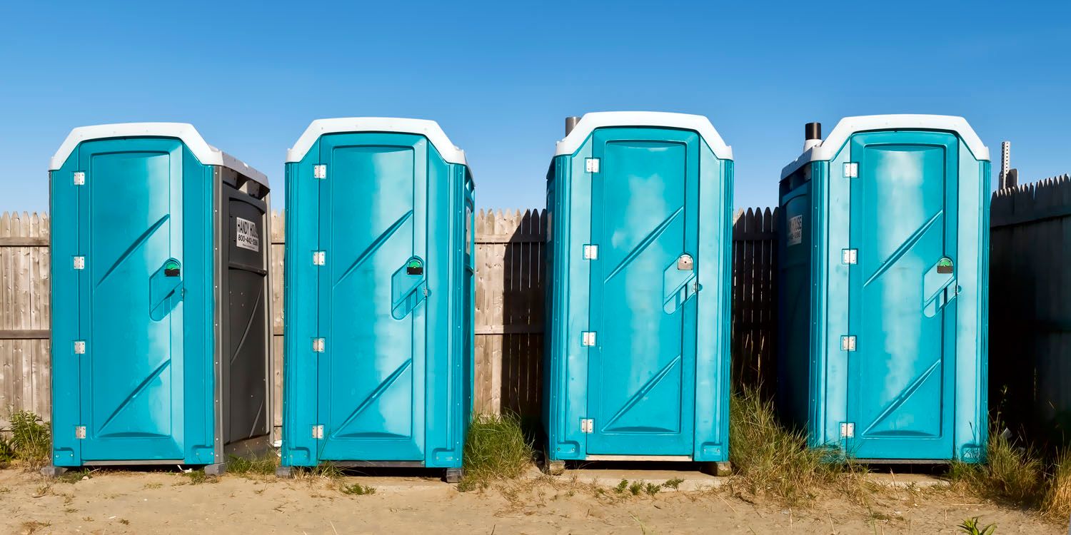 Portable toilets at the beach.