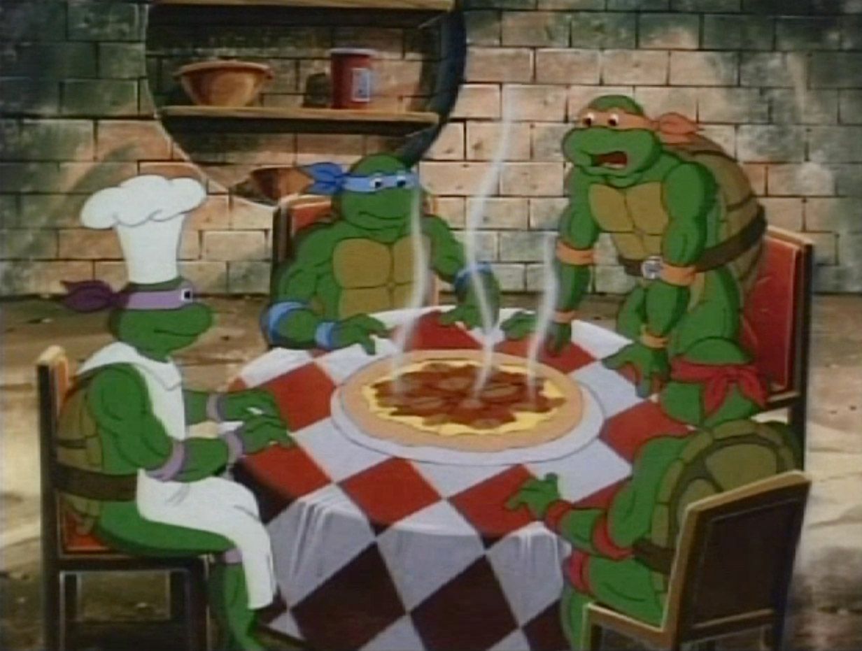 baby ninja turtles eating pizza 1990