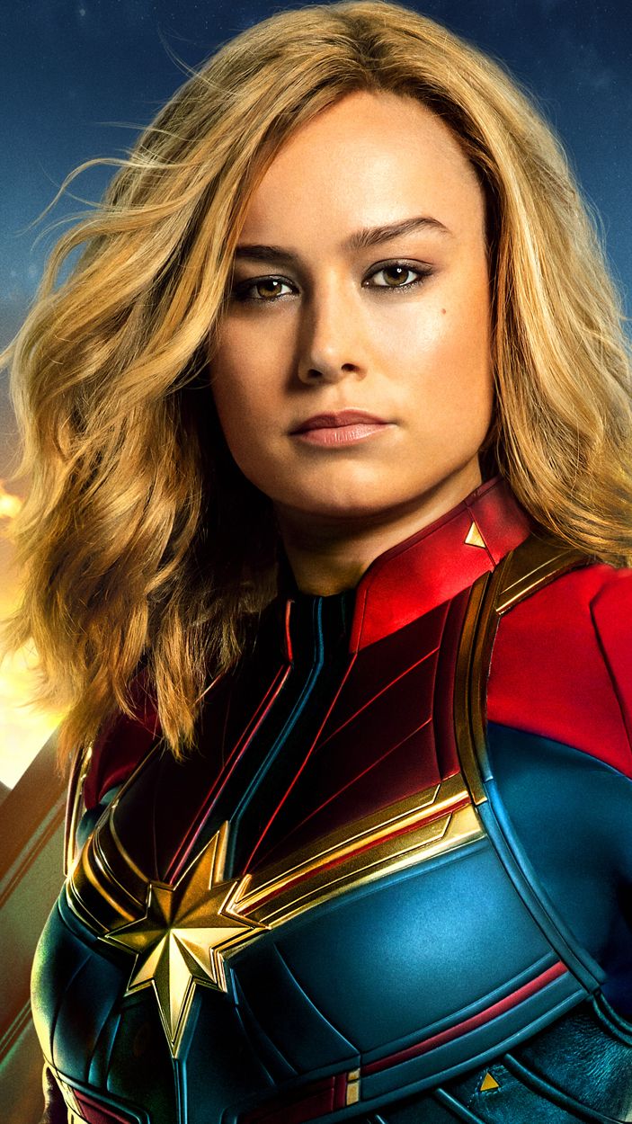 Captain Marvel wears her modern costume.