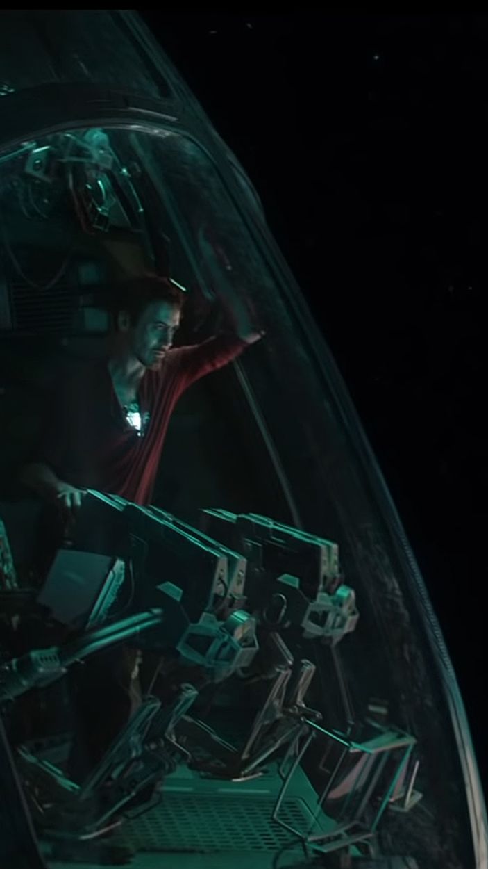 Iron Man floats adrift in space.