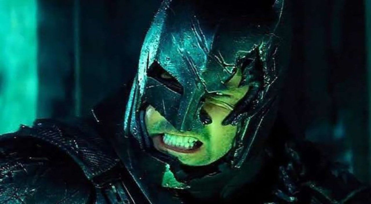 Batman with part of his face exposed