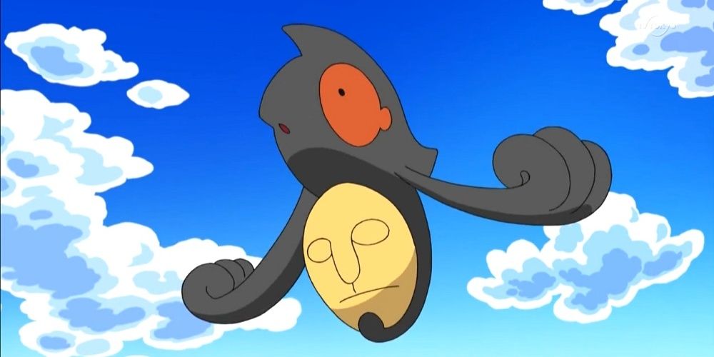 A Yamask floats through the air in Pokemon
