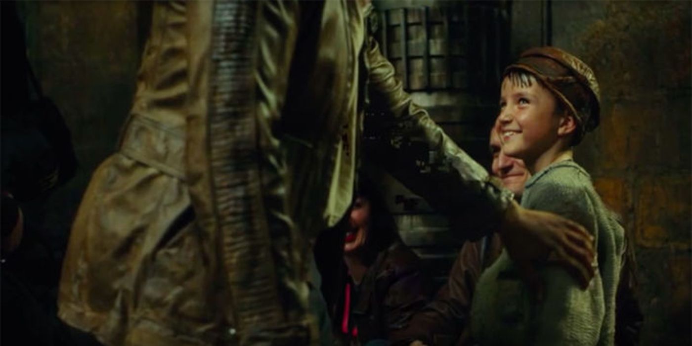 The stable boy smiles up at Finn in Star Wars: The Last Jedi.