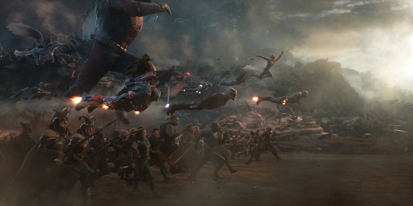 An army of MCU heroes charge into battle with a pile of debris looming behind them