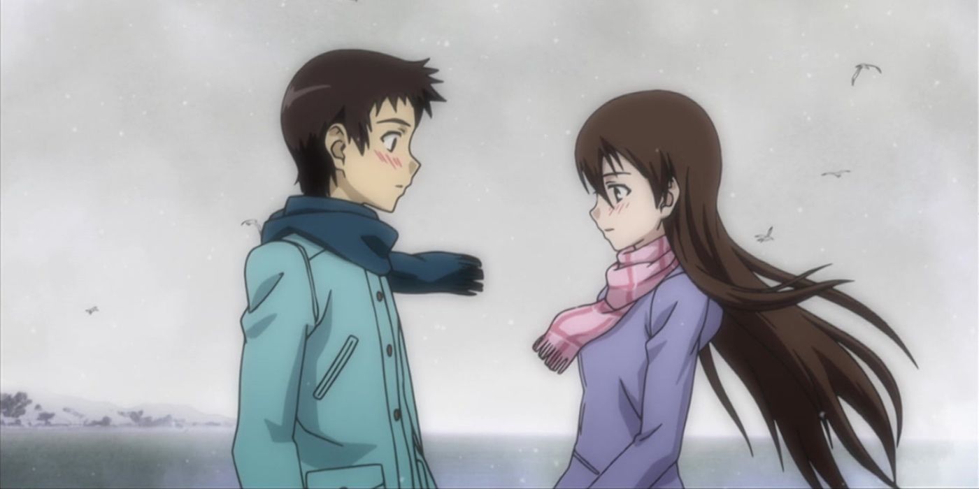 Hiromi Yuasa and Shin'ichirō Nakagami are standing on a beach together in the winter in True Tears.