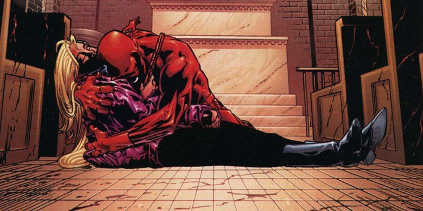 Daredevil holding Karen Page's body