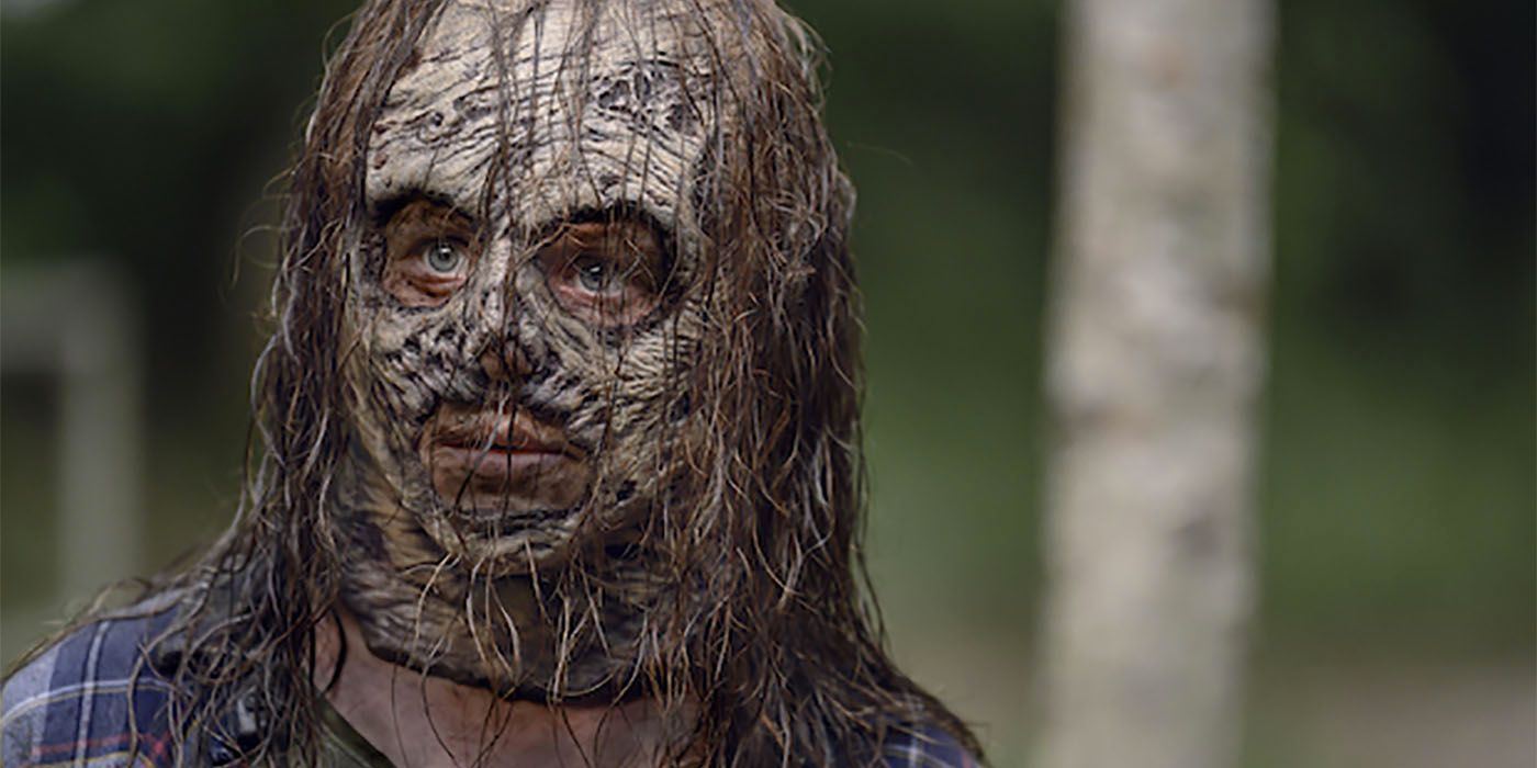 Gamma with a Whisperer mask on in The Walking Dead