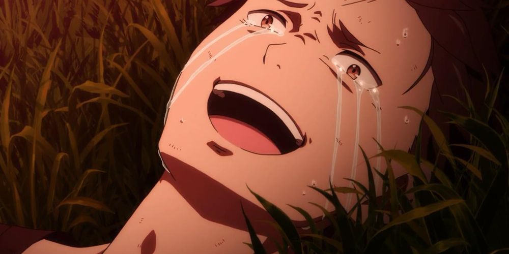 Natsuki Subaru from Re Zero, lying on the ground with tears streaming down his face