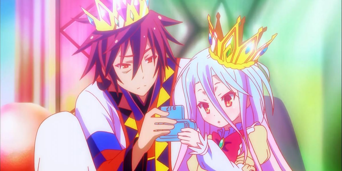 Sora and Shiro studying a device in No Game No Life.