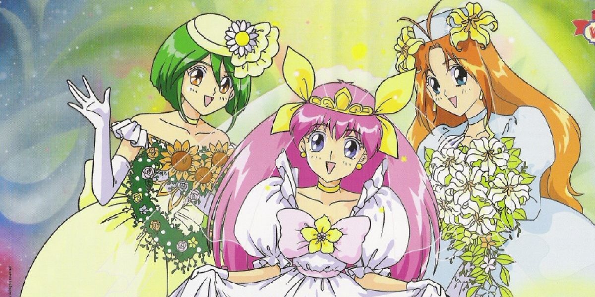 The three magical girls from Wedding Peach in wedding gowns, holding bouquets