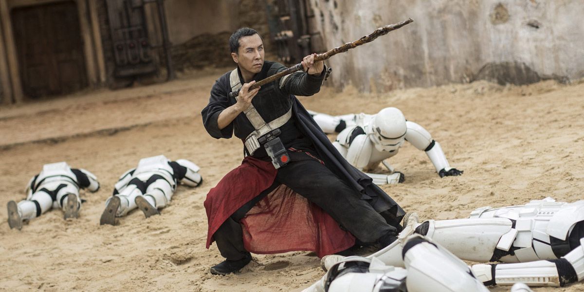 Chirrut Imwe surrounded by unconscious stormtroopers in Rogue One: A Star Wars Story