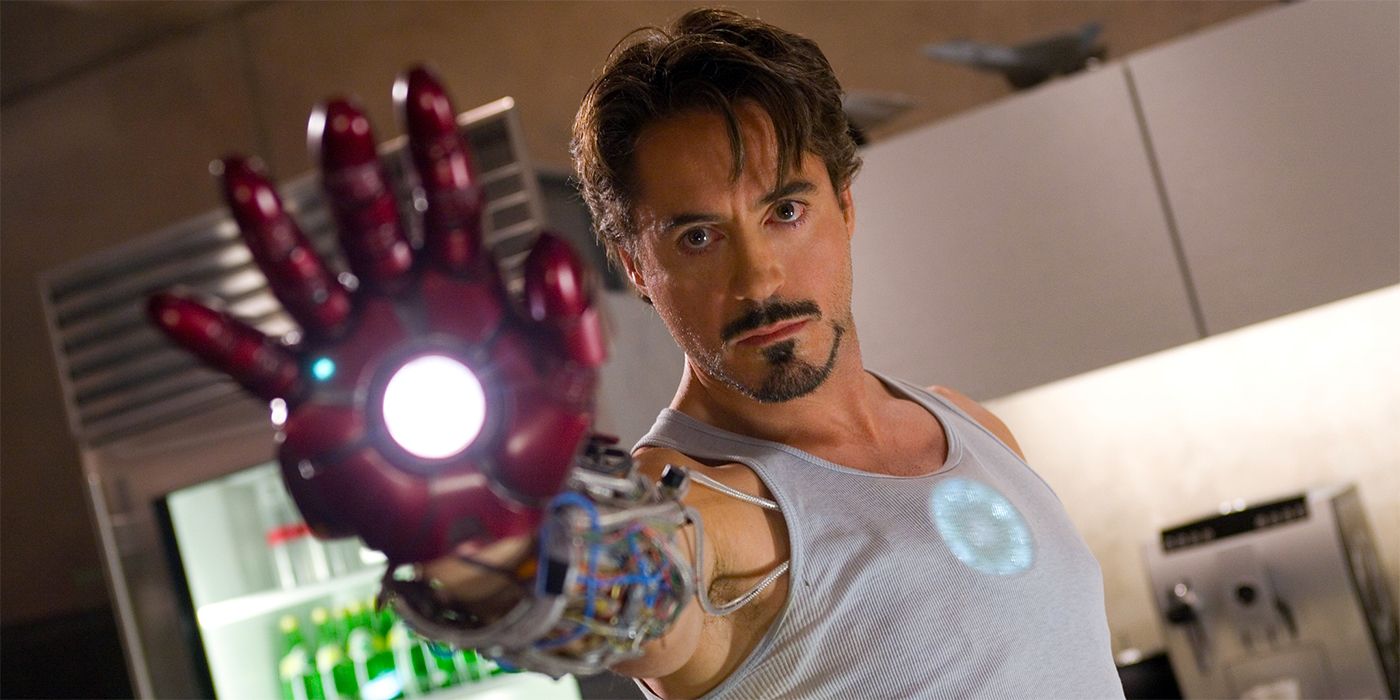 Tony Stark extends his hand wearing the Iron Man gauntlet