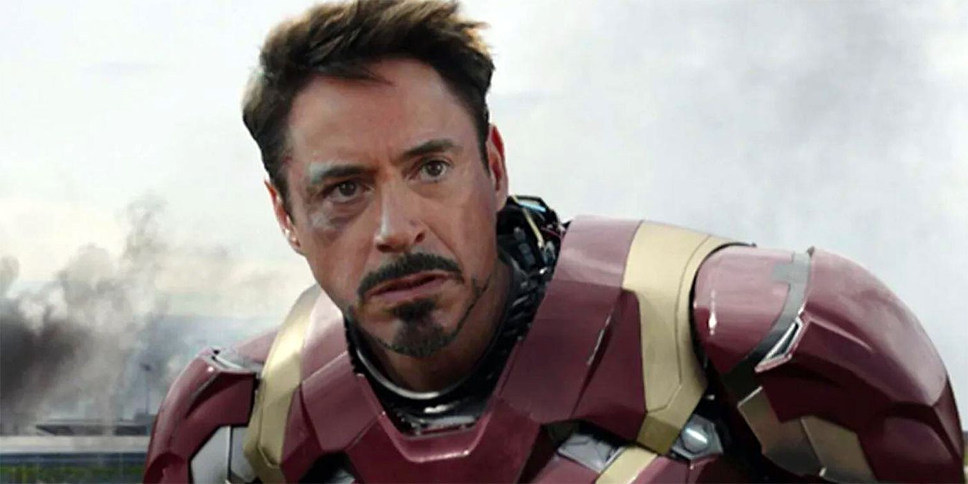 Iron Man looks on in the middle of a field in Captain America: Civil War