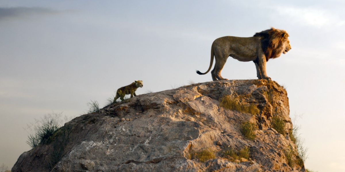 Mufasa teaching Simba a lesson on top of a cliff in the CGI The Lion King