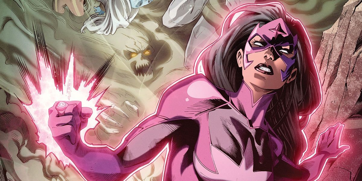 An image of Star Sapphire powering up and fending off several enemies