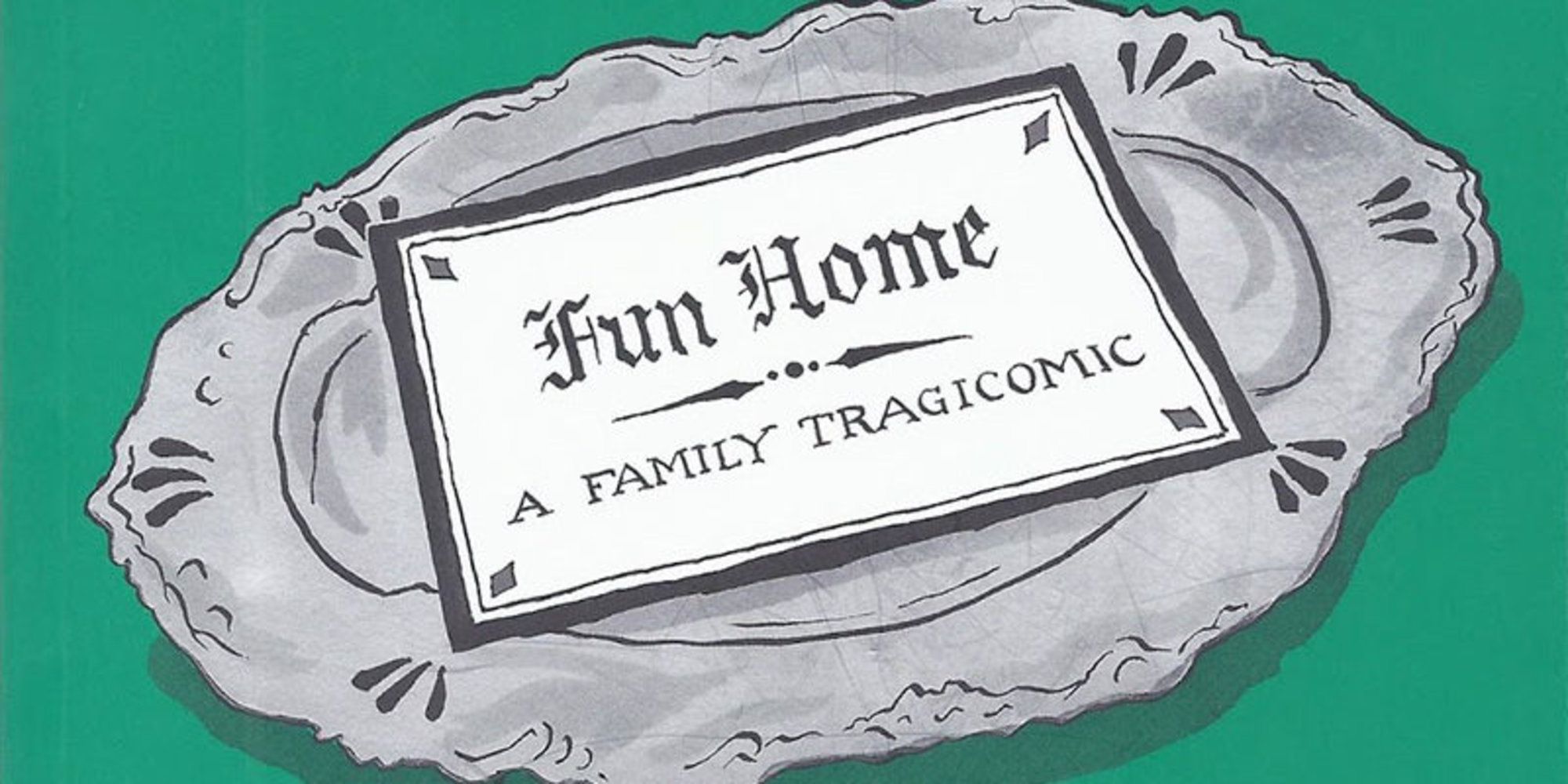 A plate with a paper that says &quot;fun home a family tragicomic&quot; on it
