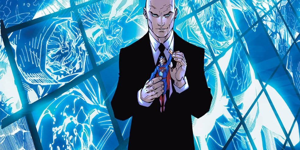 Lex Luthor smiling as he holds a Superman action figure in DC Comics
