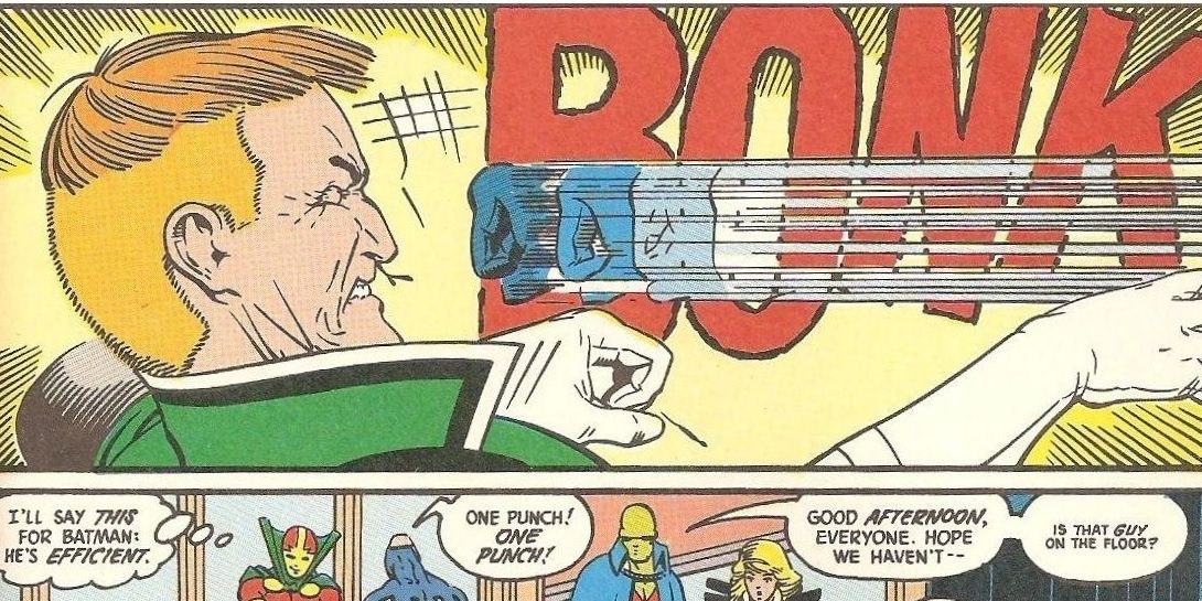 DC Comics' Guy Gardner getting punched by Batman with the JLI looking on