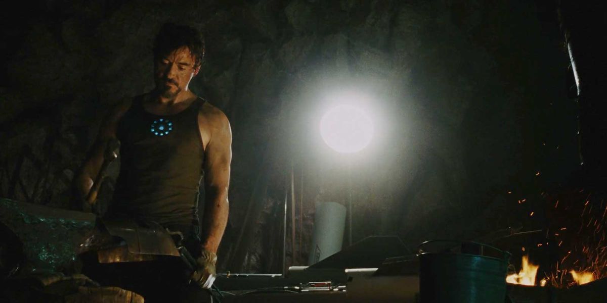Tony Stark building his first suit in a cave in Iron Man movie