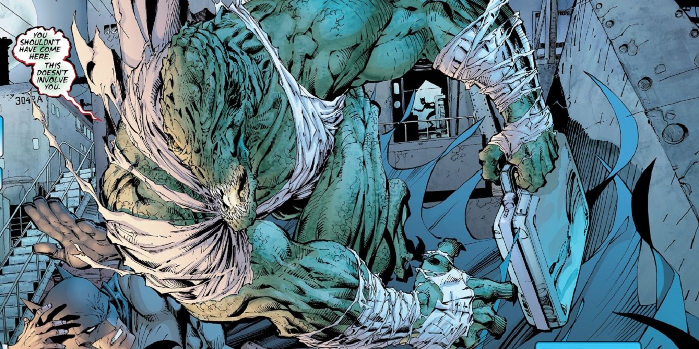 Killer Croc Holding A Briefcase While Fighting Batman