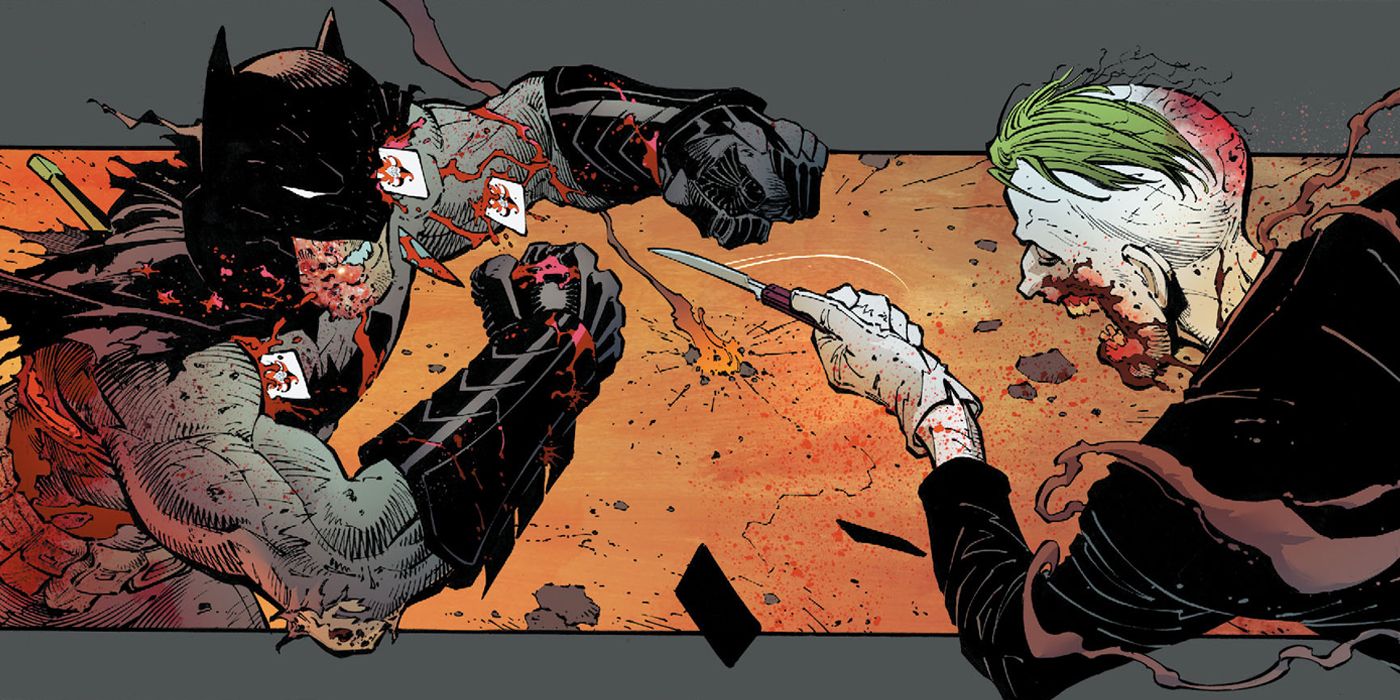 A bloody Batman fights against the Joker, who's sliced Batman with numerous playing cards.