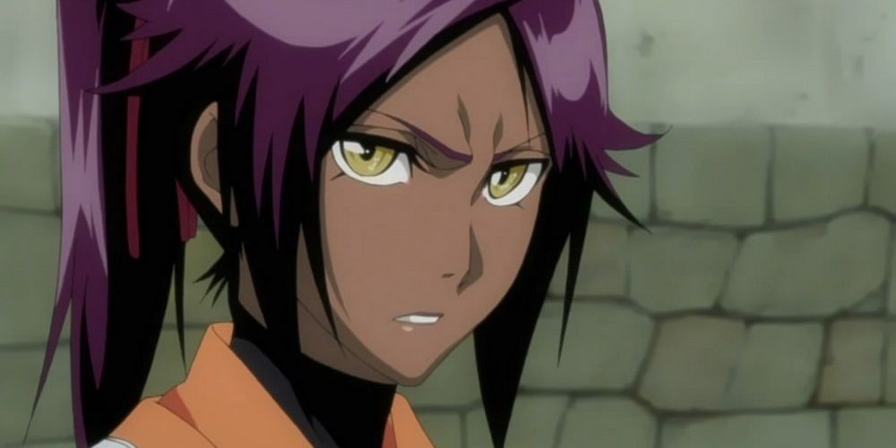 Yoruichi looks concerned in Bleach.