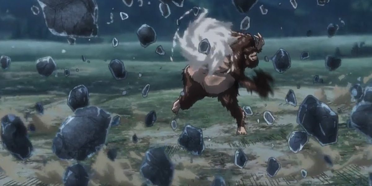the beast titan throws some rocks at the viewer.