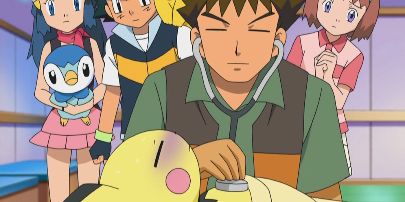 Brock Pokemon treats Pichu while others watch