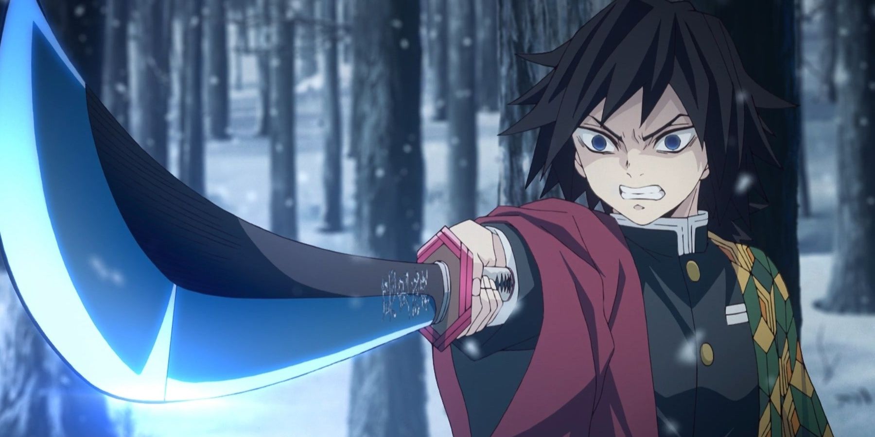 Giyu Tomioka, the Water Hashira, from Demon Slayer holding his blade in the snow. 