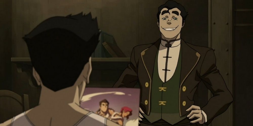Bolin smiling in a suit