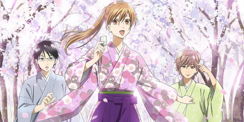Chihayafuru main cast holding Karuta cards under cherry blossom trees