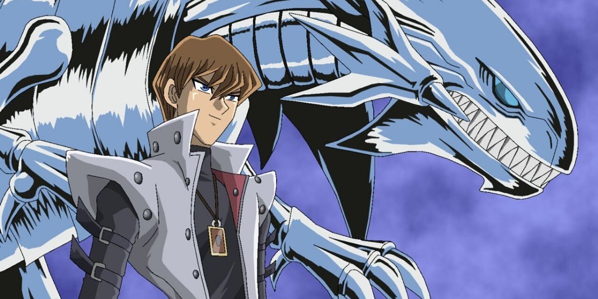 Seto Kaiba, antagonist of the Yu-Gi-Oh! anime, next to his strongest monster, the Blue-Eyes White Dragon
