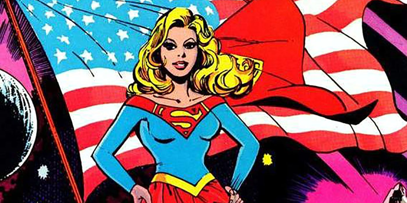 Supergirl stands in front of the American flag
